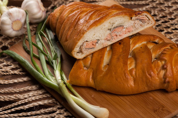 Pie on the table with food set