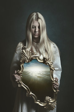 Woman holding magical mirror