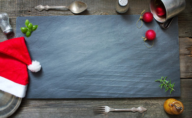 Christmas abstract culinary background on old retro black stone
