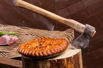 Pie on the table with food set