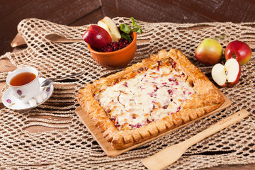 Pie on the table with food set