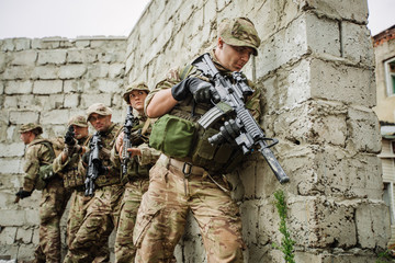 Army soldier during the military operation in the city. war, arm