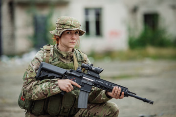 Fototapeta premium Army sniper during the military operation in the city. war, army