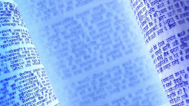 Calligraphic handwritten notes in Devanagari. Blue background loop.