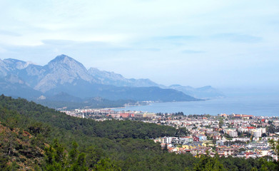 Fototapeta na wymiar View of the town of Kemer and sea from a mountain. Turkey