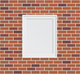 White photo frame on brick wall