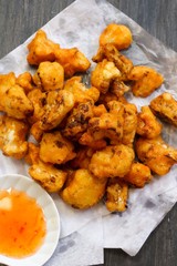 batter fried cauliflower florets, selective focus