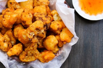 batter fried cauliflower florets, selective focus