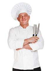 Chef man holding two knifes.