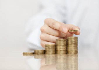 Rising stack of coins