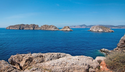 Fototapeta na wymiar Rocky landscape, Mediterranean ocean and islets of Malgrats