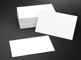 stack of business cards on black background
