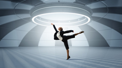 Fototapeta na wymiar Dancing businesswoman in virtual room . Mixed media