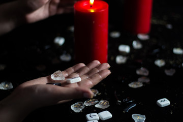 runes in the hand of the witch
