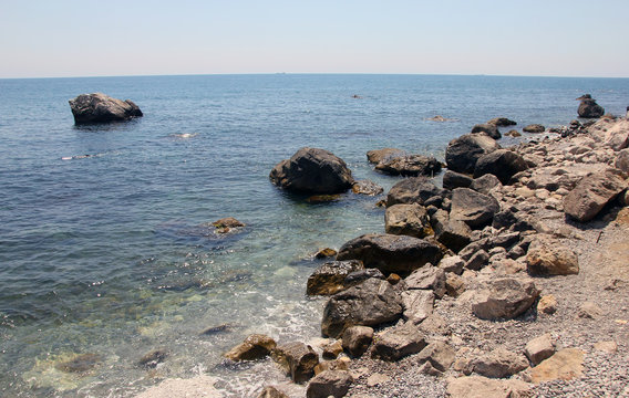 beautiful picturesque wild Black sea coast with boulders and roc