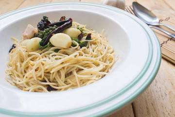 The spaghetti sauce with basil and squid Thailand