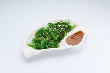 Hiyashi Wakame Chuka Salad or seaweed salad with nut sauce