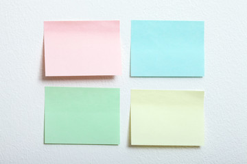collection of colorful post it paper note close up on white background