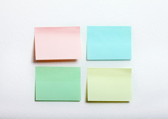 collection of colorful post it paper note close up on white background