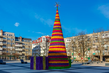 Fototapeta premium Christmas tree in the usual modern residential area in Wroclaw, Poland