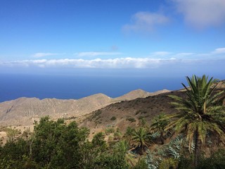 Kanaren Gomera Berge Wald Landschaft Meer Palme Wolken