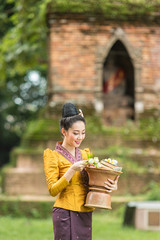 Asian Woman dressed in traditional costume in temple, Thailand .