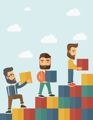 Three men with blocks