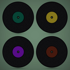 Four records on green background