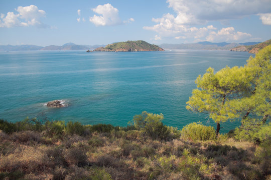 Gulf with island in Aegean Sea. Yaniklar, Mugla, Turkey