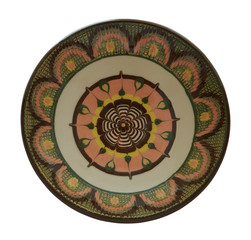 Ceramic plate painted in flanders technology. Isolated on a whit
