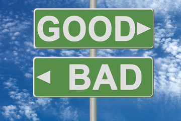 Signpost on green nameplate on sky background