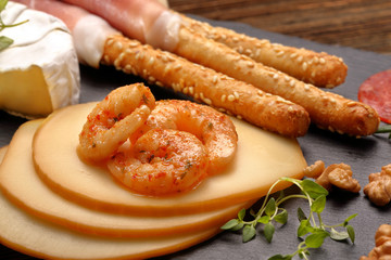 Appetizer set with cheese and shrimps