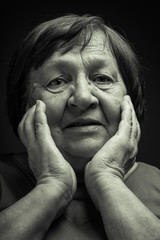 Portrait of elderly woman. Question. Toned