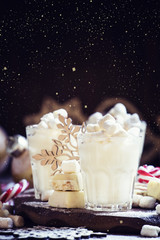 Hot white chocolate with marshmallows in a xmas decoration with