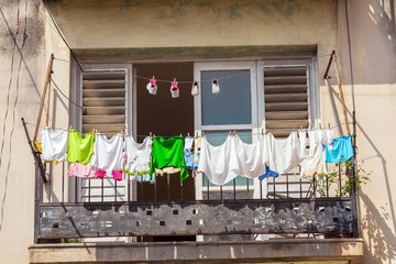Fresh laundry on the balcony of old home, Havana