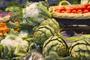 Green vegetables. Artichoke. The market in France.