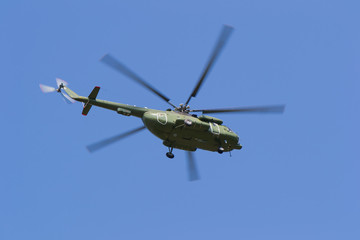 Helicopter flying in the sky in search of people