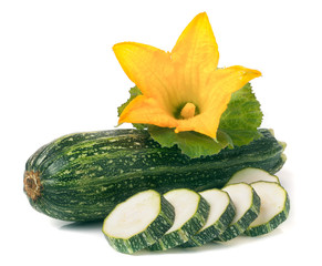 One zucchini with leaf and flower isolated on white background