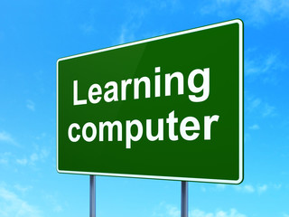Learning concept: Learning Computer on road sign background