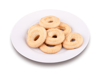A few tea cookies on a plate
