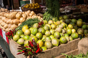 Lemons and vegetables in market stall, Palermo, Sicily