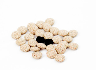 Close Up of Plain Compress pills of Medicinal Herb Powder