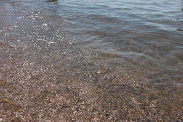Wave of the sea on the sand beach