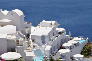 Residential buildings with sea view - Santorini island, Greece.