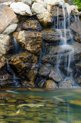 Fototapeta na wymiar Waterfall in the park