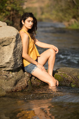 Fototapeta premium Natural Lifestyle Fashion Model in Handmade Top in Nature