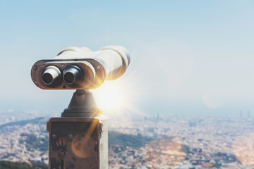 Touristic telescope look at the city with view of Barcelona Spain, close up old metal binoculars on background viewpoint overlooking the mountain, hipster coin operated in panorama observation, mockup - Powered by Adobe