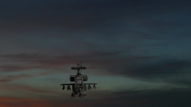 Apache gunship flying against dramatic sky