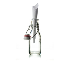 glass bottle with a message isolated on a white background