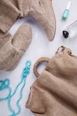 Still life of fashion modern woman. Feminine cosmetic background.Women's set of fashion accessories in beige tones with the addition of bright accents.selective focus.